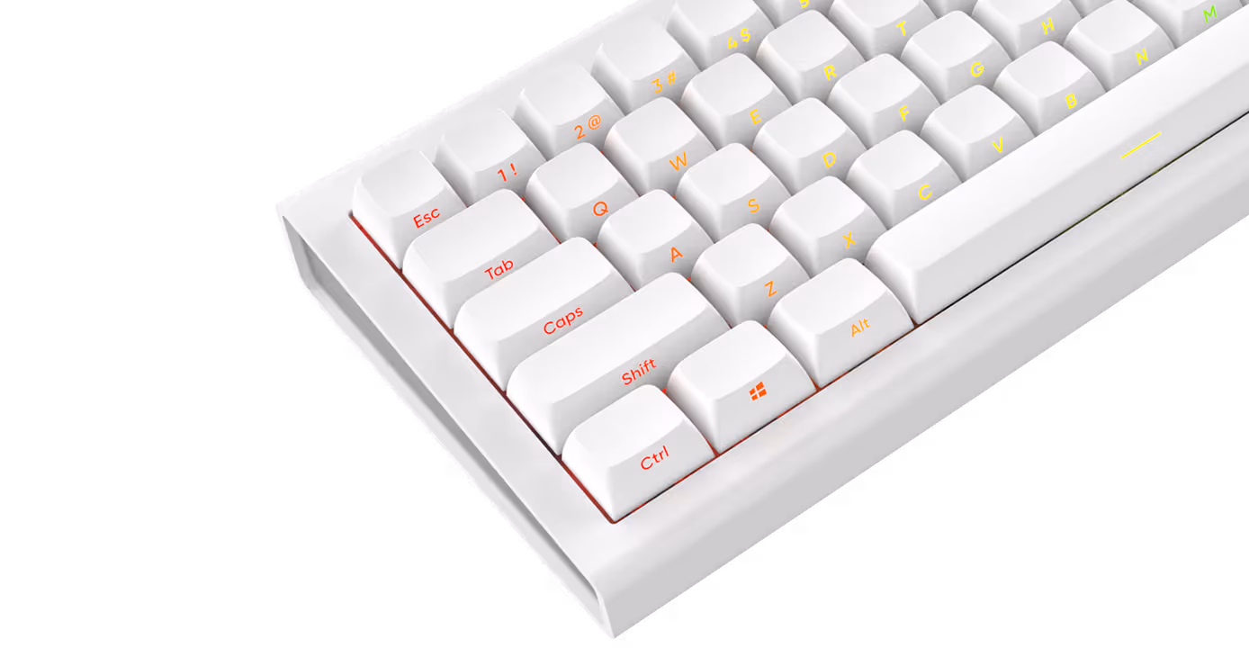 Close-up of a white mechanical keyboard with colorful legends on the keys, featuring red, orange, and yellow letters and symbols.