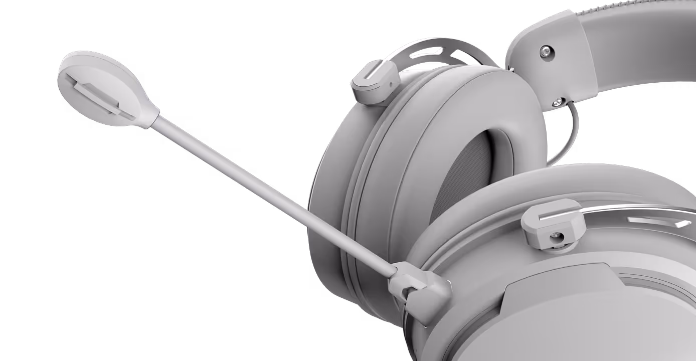 Close-up of a gray over-ear gaming headset with a flexible microphone attached.