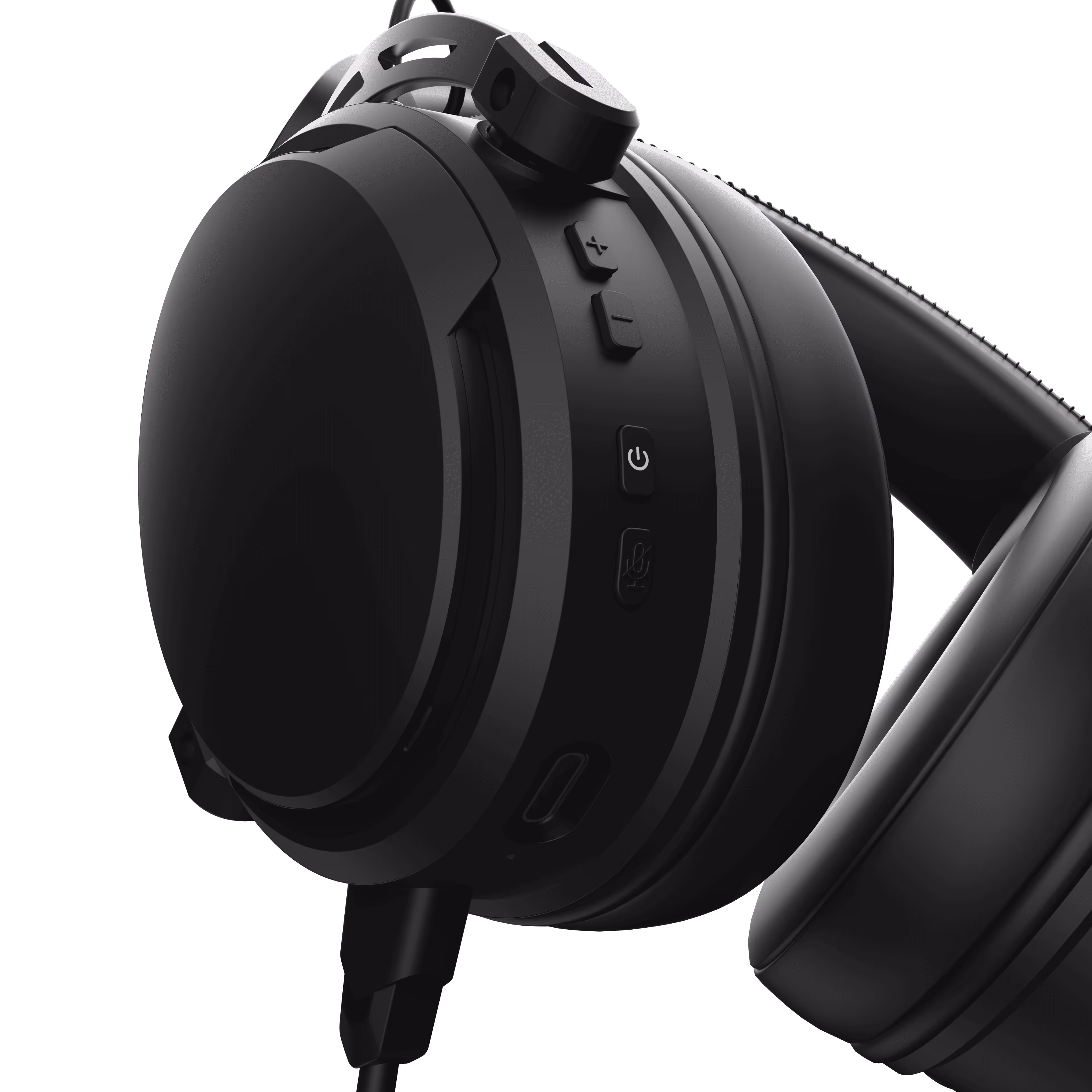 Close-up of black over-ear headphones showing control buttons and a charging port.