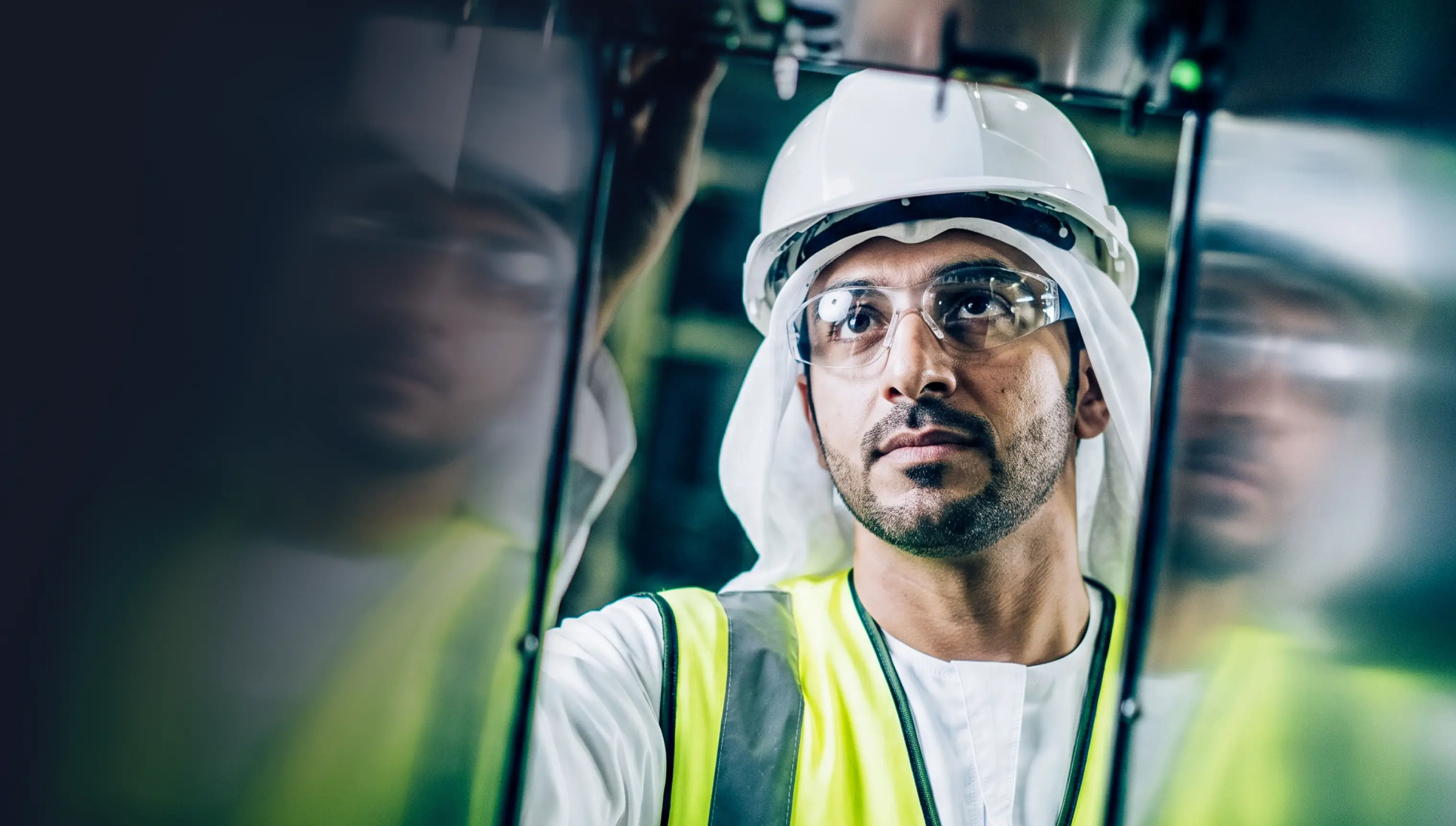 Engineer in a hard hat and safety glasses