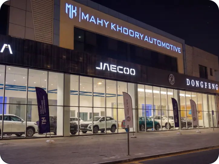 M.A.H.Y. Khoory Automotive showroom for Dongfeng, OMODA and JAECOO at night