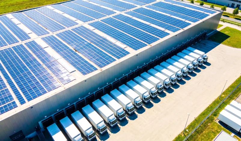 Solar panels covering a large warehouse roof