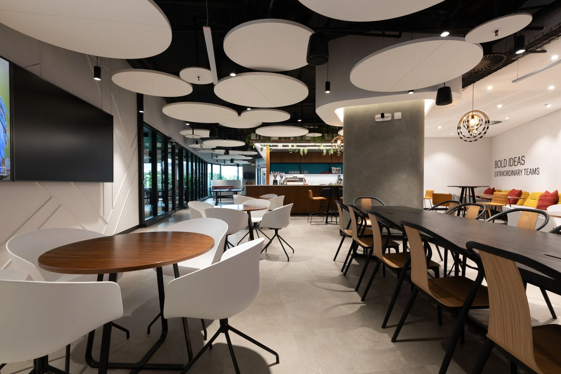 a restaurant with a long table and chairs