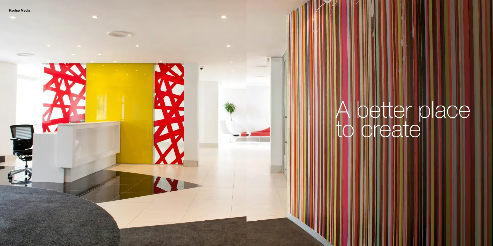 a reception area with a colourful striped wall