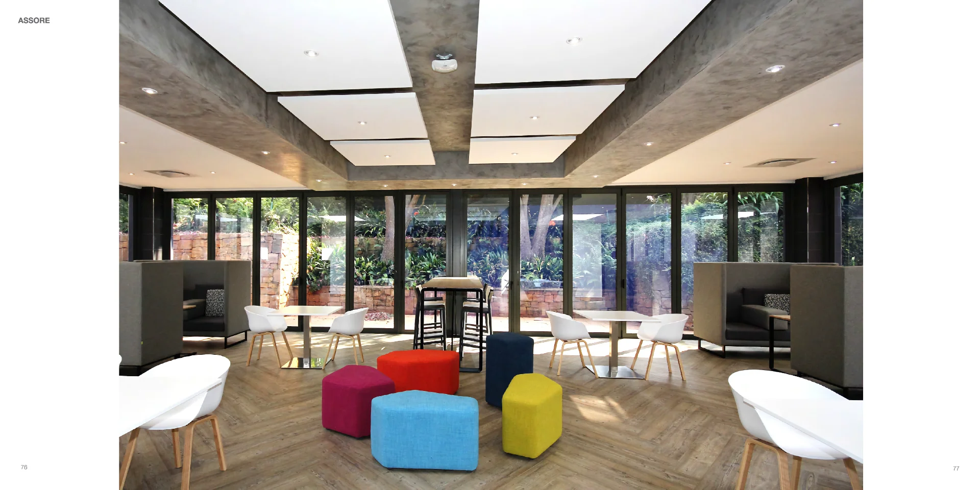 a room with a lot of chairs and tables