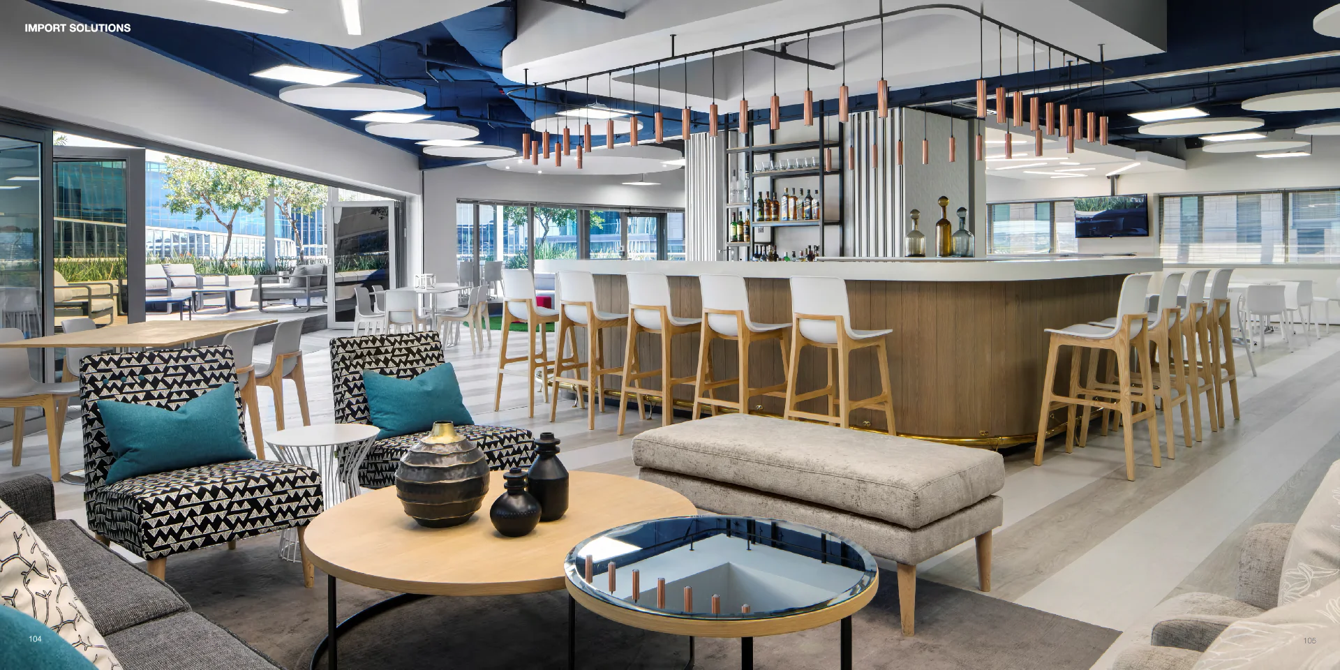 a room filled with lots of furniture and a bar