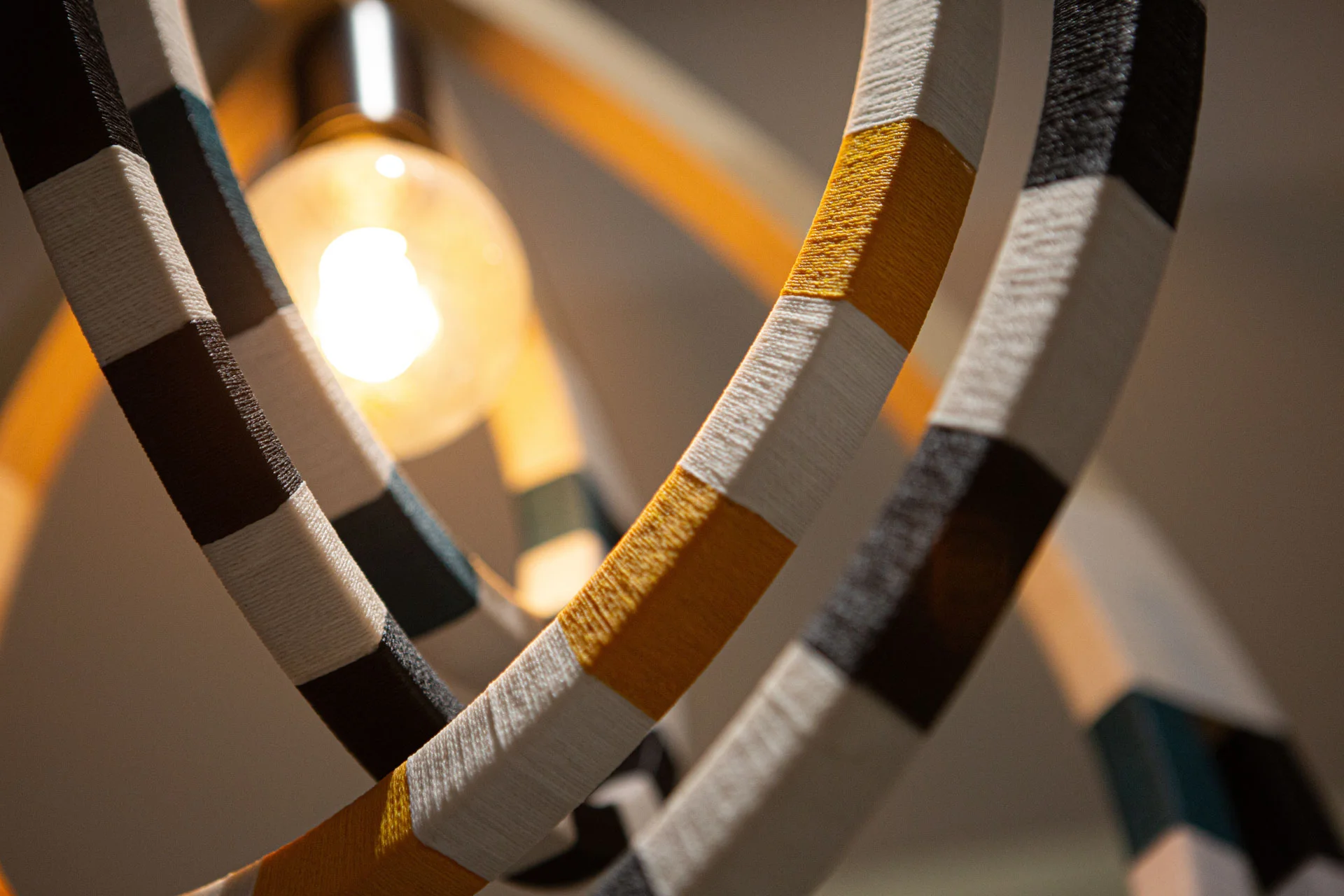 a close up of a light fixture with a light bulb