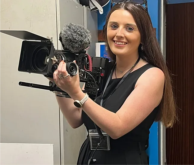 woman holding camera