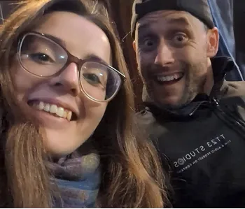 man and woman posing for selfie