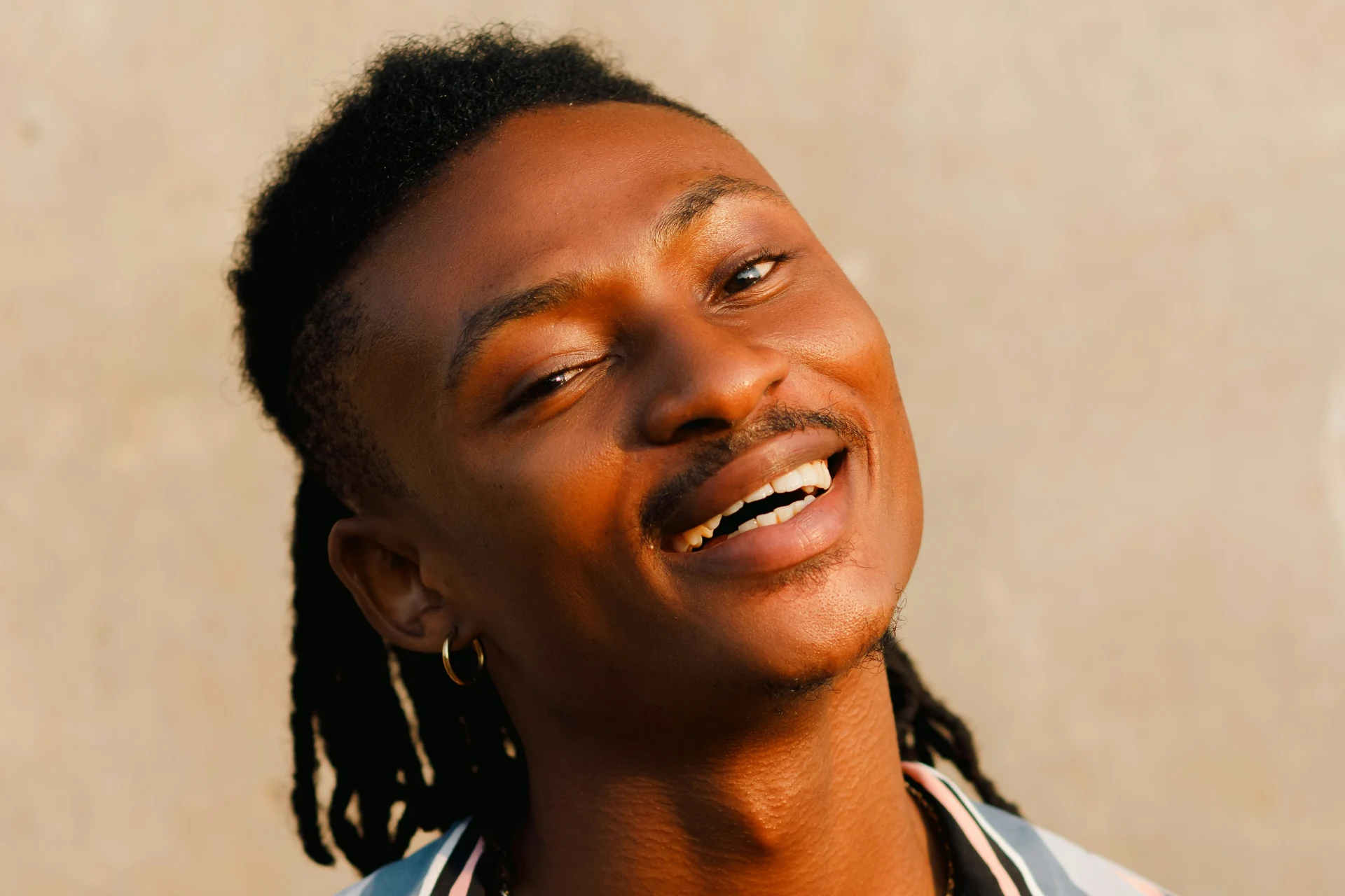 Woman smiling in warm sunlight