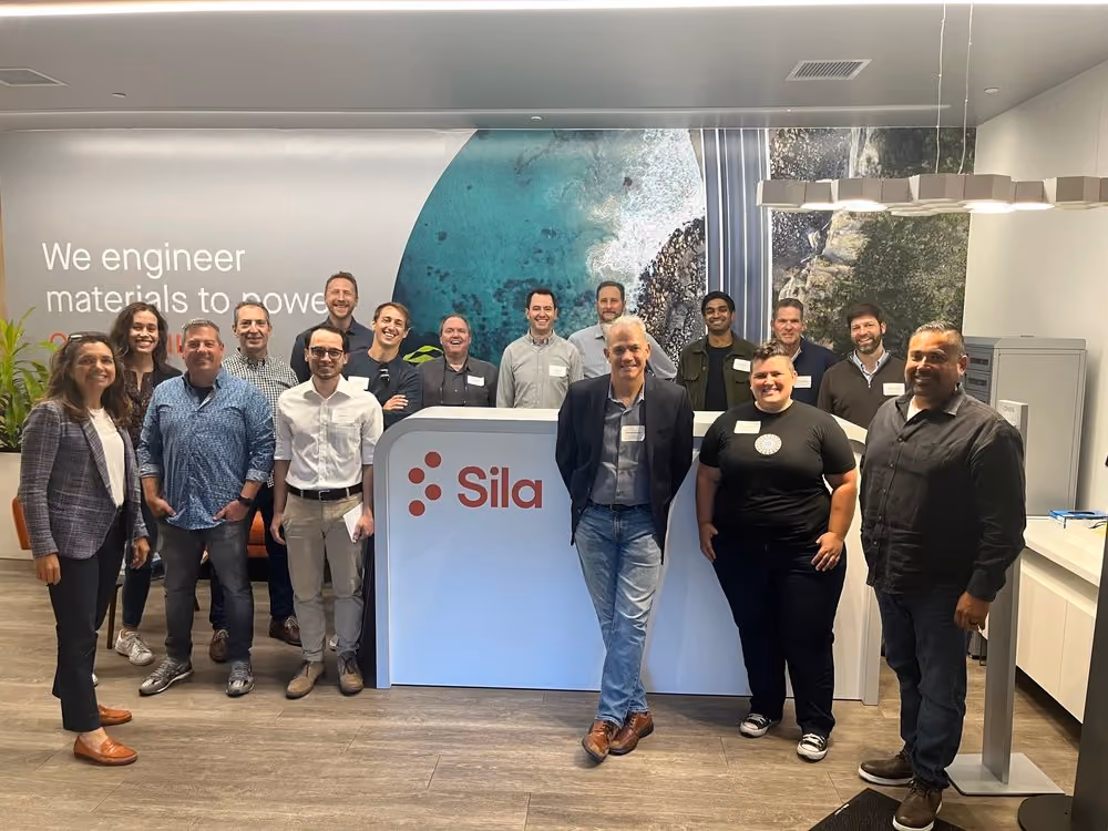 A photo of a team at the sila office.