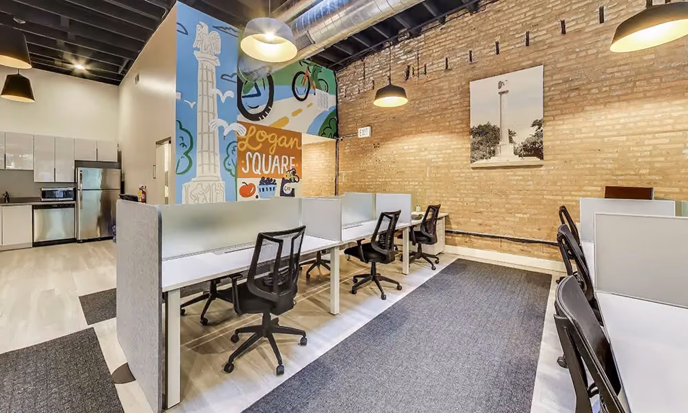 Chic and modern dedicated desk area at Desk606, downtown Chicago's leading coworking space, and fully furnished private offices.
