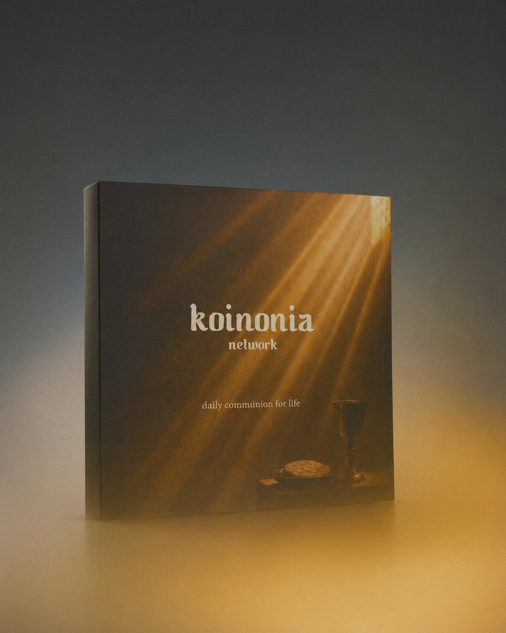 The Koinonia Network membership collection keepsake box lit by a warm window