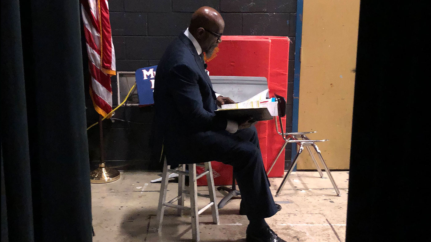 Speaker preparing backstage