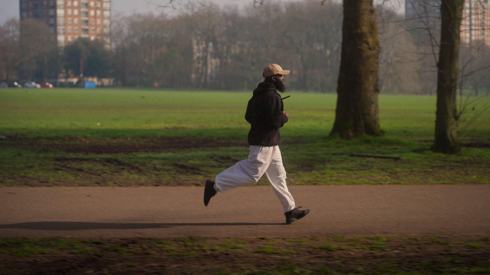 On The Line — competitor running through a park