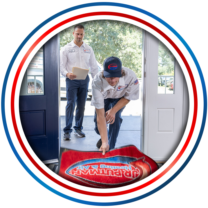 A JR Putman technician showing care and respect at a customer’s home