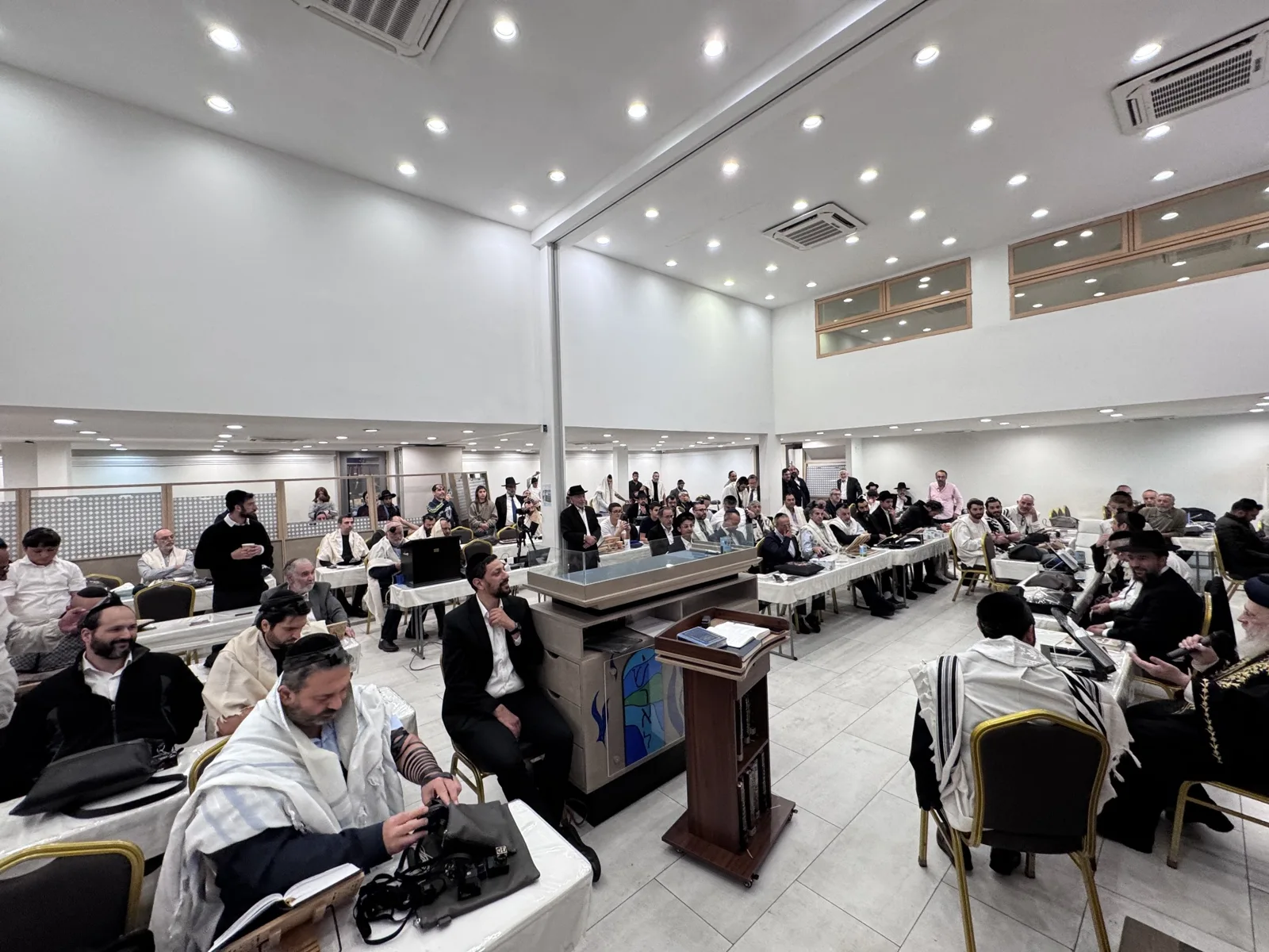 Community prayer at Shuvah Israel