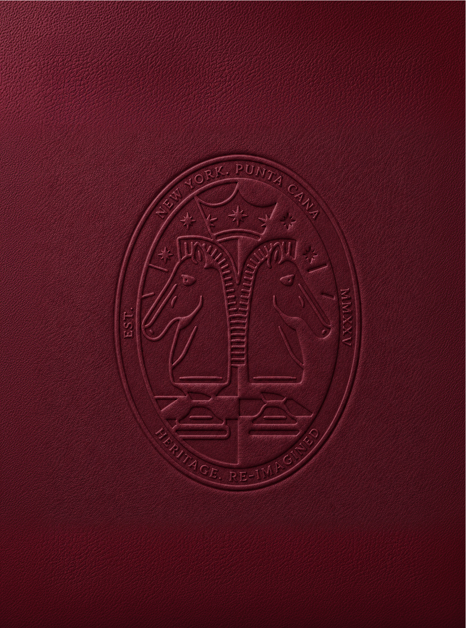 LUJO crest embossed into deep burgundy leather