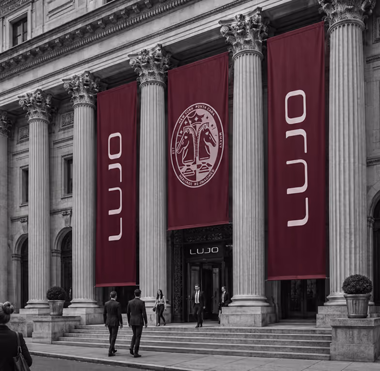 LUJO banners hanging between the columns of a neoclassical building