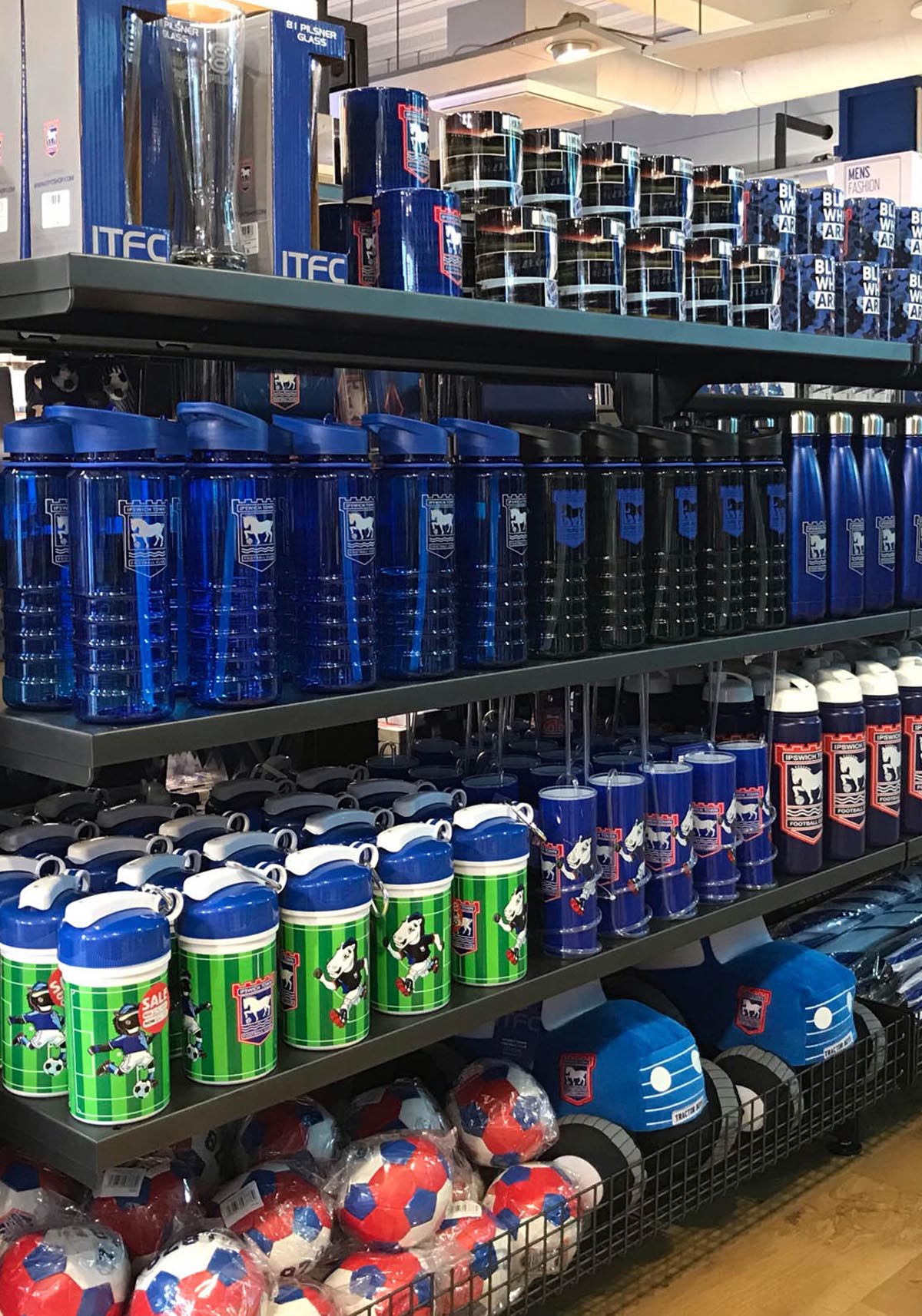 Ipswich Town FC merchandise displayed on retail shelves