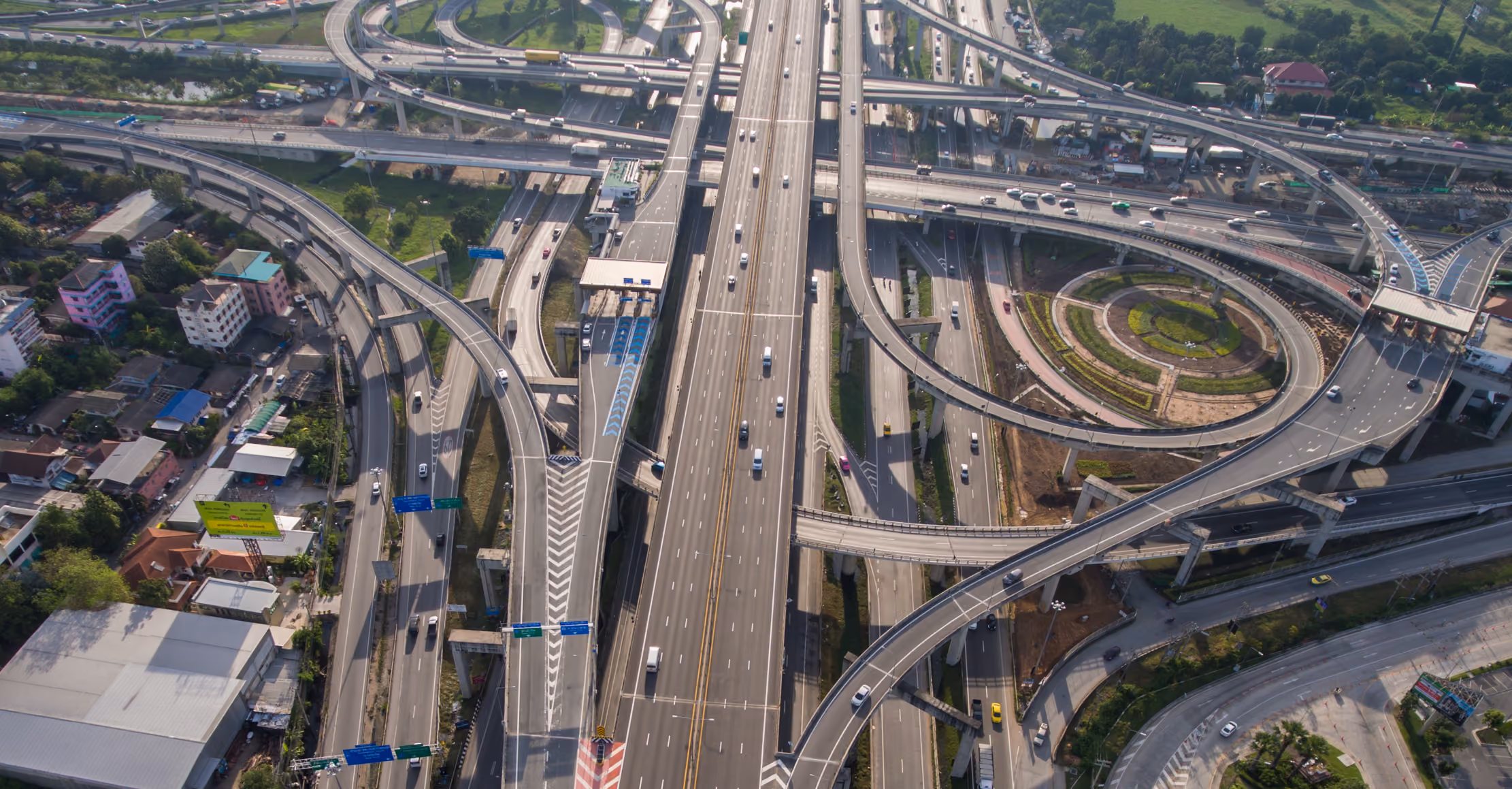 Aerial view of a multi-level highway interchange, the kind of road network where GoodVision runs incident detection on existing CCTV cameras