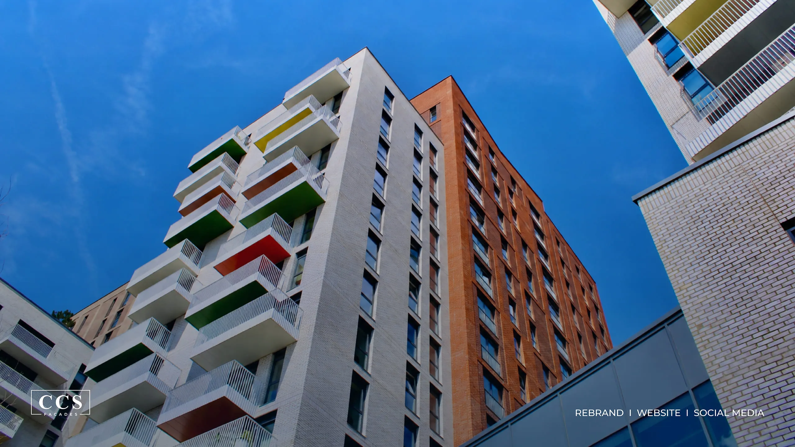 CCS Facades colourful apartment building facade against a blue sky, rebrand, website and social media by Just Chill