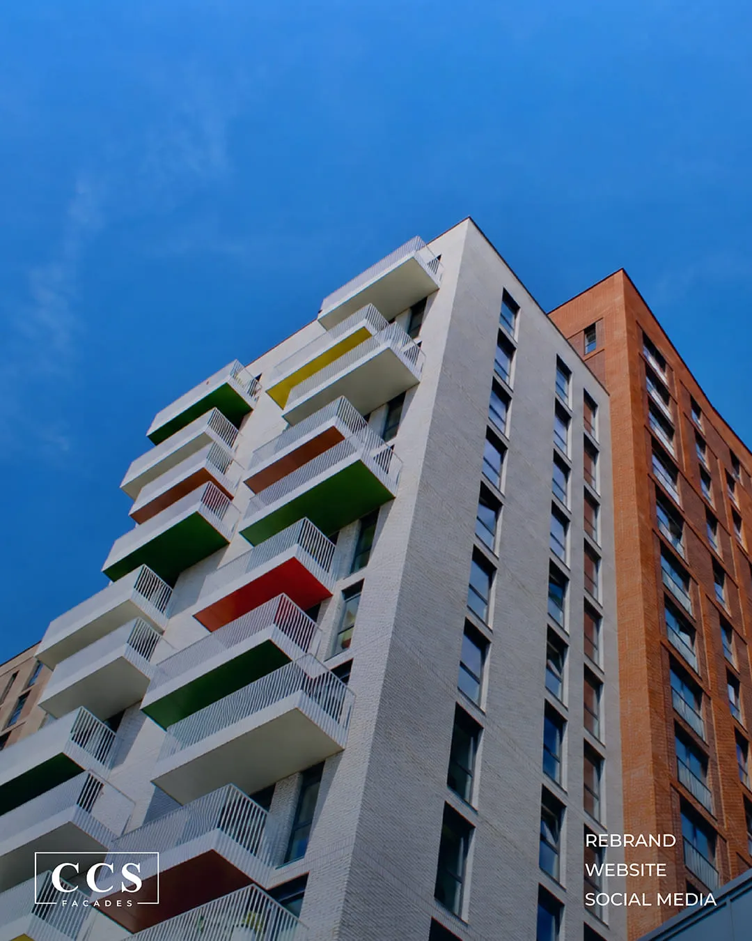 CCS Facades colourful apartment building facade against a blue sky, rebrand, website and social media by Just Chill
