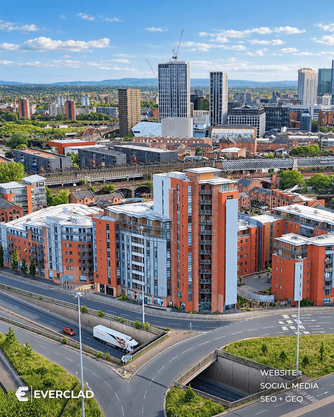 Aerial view of Everclad-clad apartment blocks in a UK city, website, social media and SEO + GEO by Just Chill