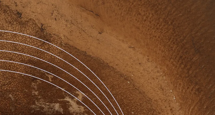 An aerial view of a sandy shoreline