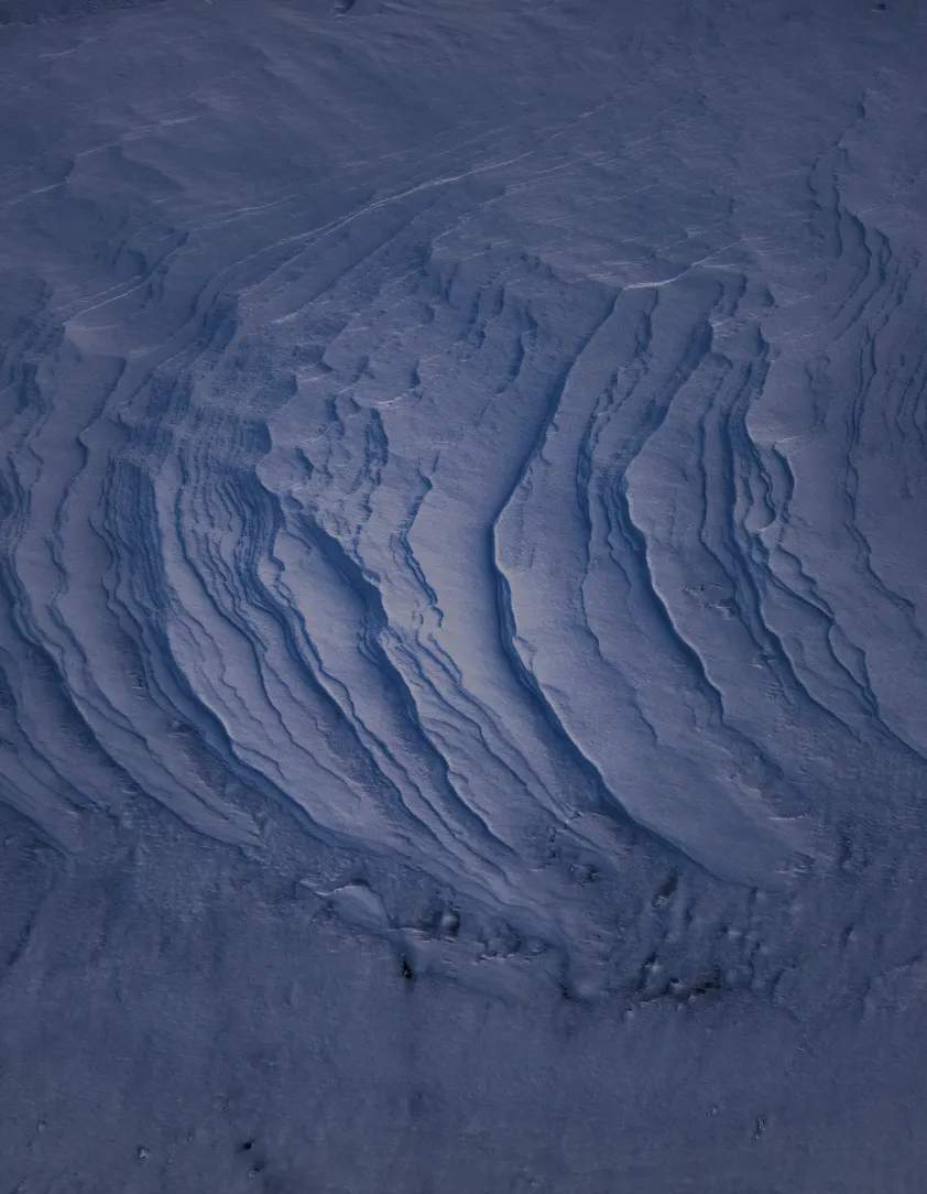 Aerial view of wind-carved snow