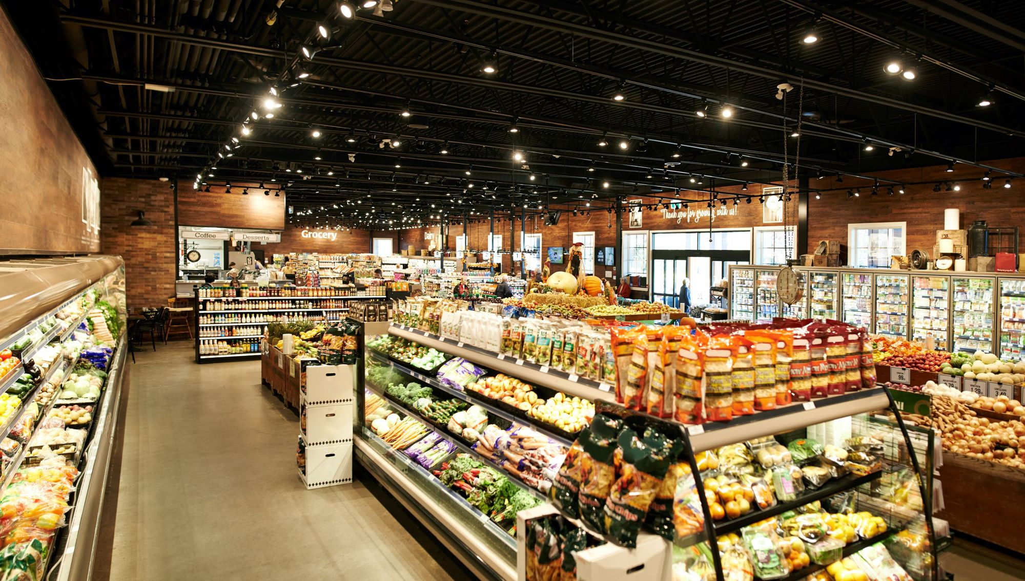 Fresh fruit and vegetable aisle in a supermarket