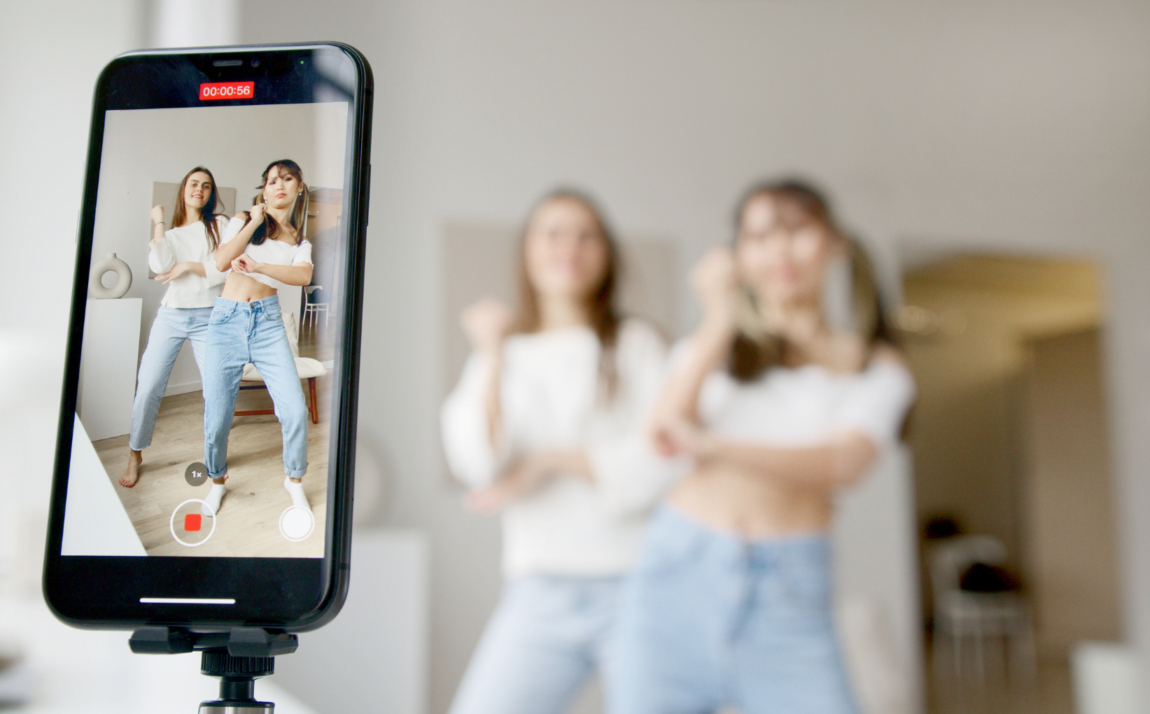 Two girls filming a reel