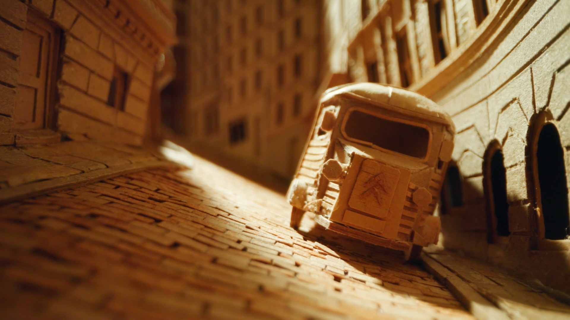 Wijnand Driessen — een kartonnen bus tussen miniatuurgevels