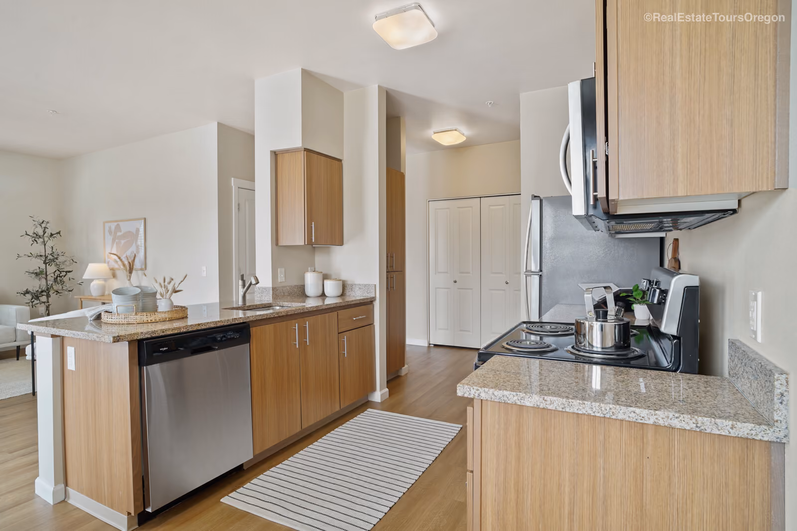 Modern kitchen with wood cabinets at The Grove in Salem, Oregon