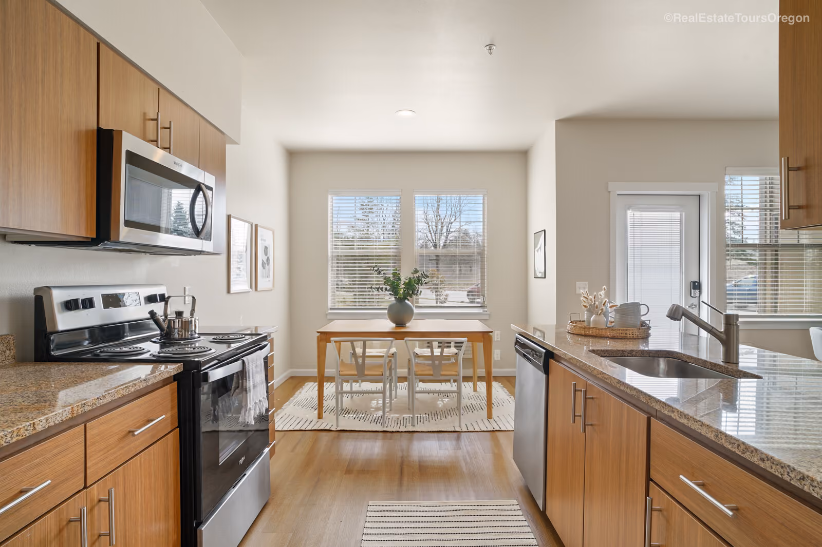 Modern kitchen with wood cabinets at The Grove in Salem, Oregon