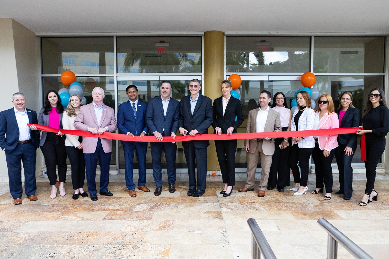 Ribbon cutting outside