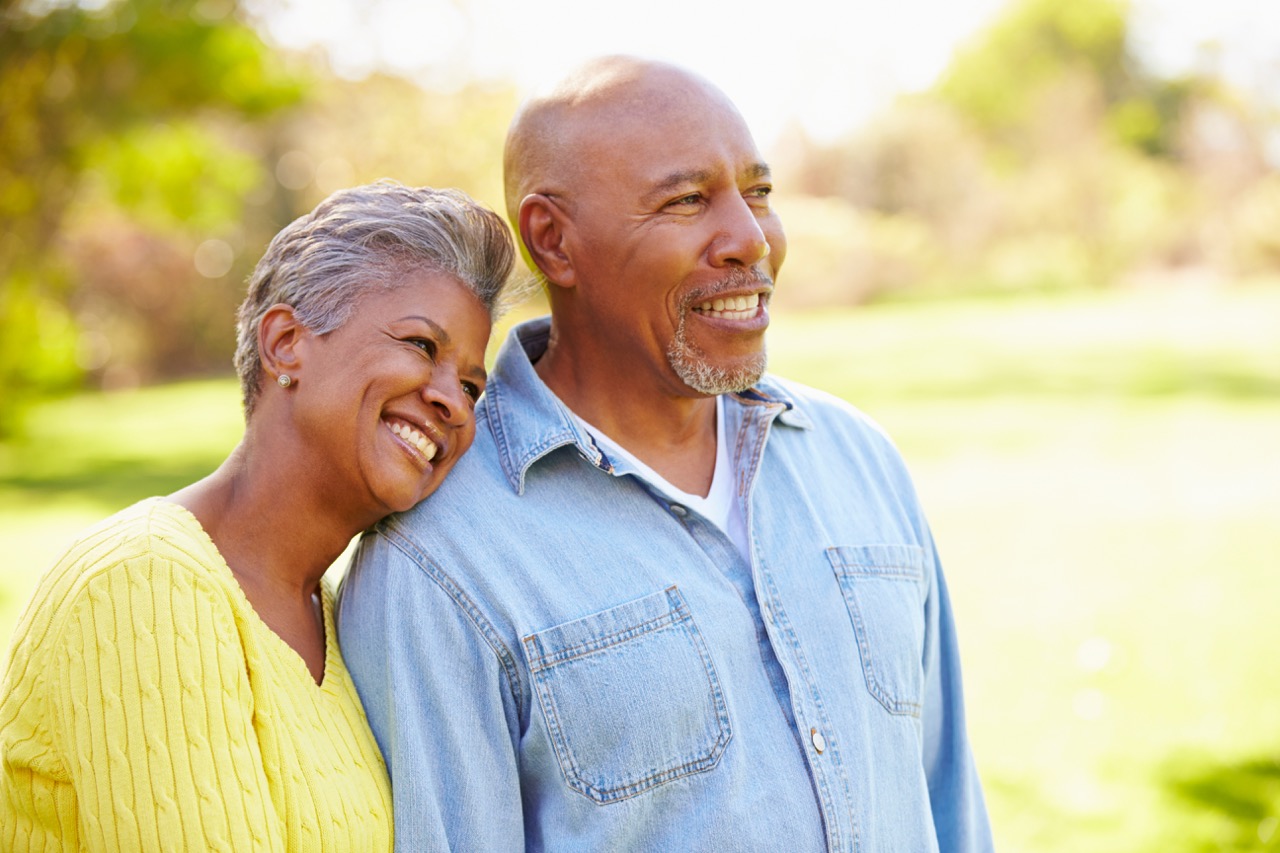 Senior couple walking together outdoors