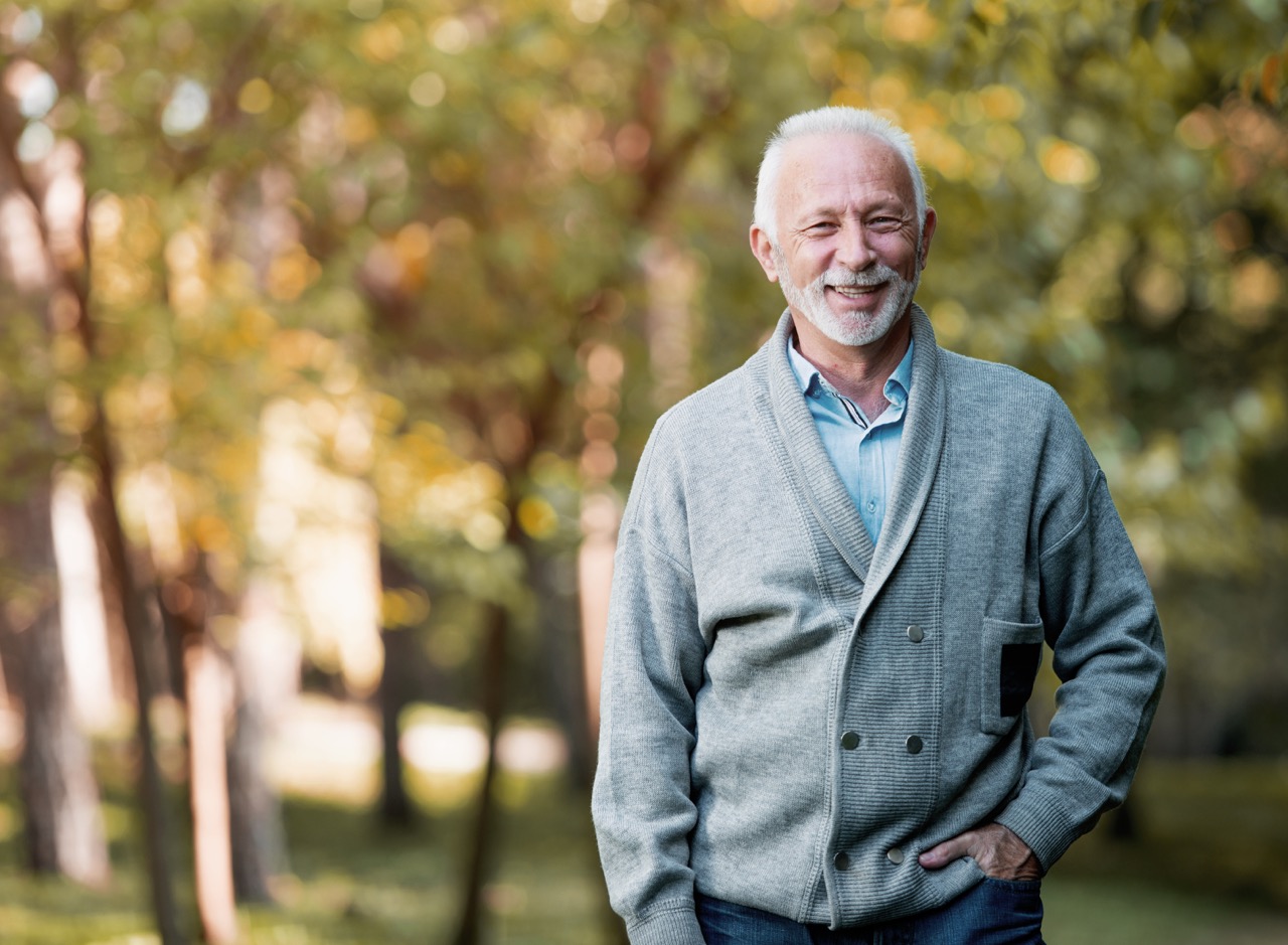 Smiling senior man outdoors