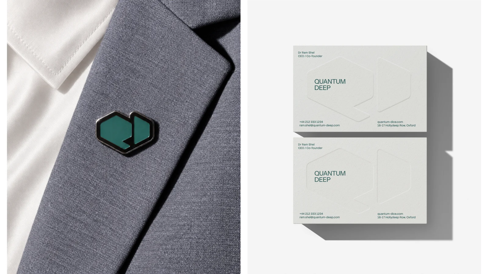 Enamel logo pin on a lapel next to business cards