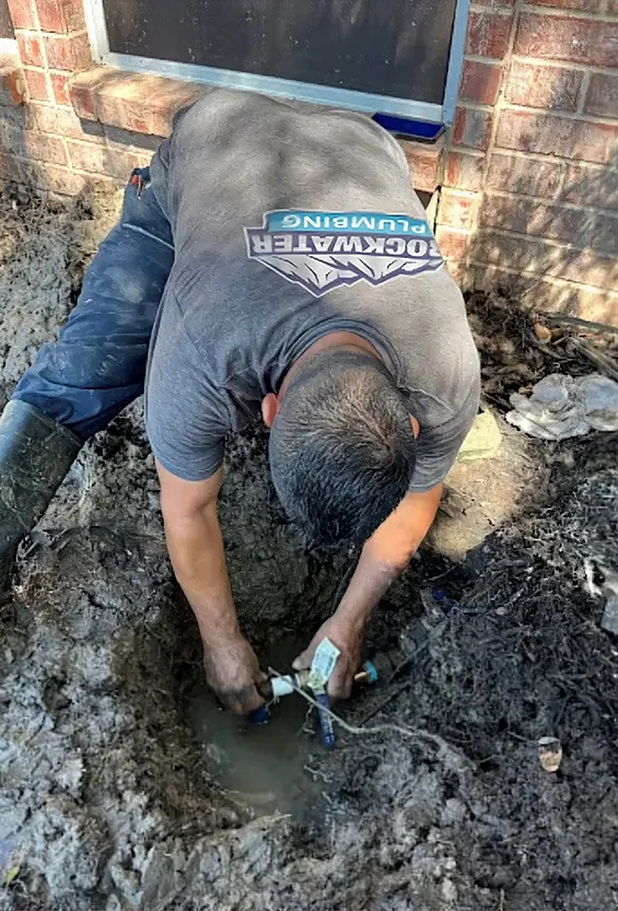 Rockwater Plumbing team with service van