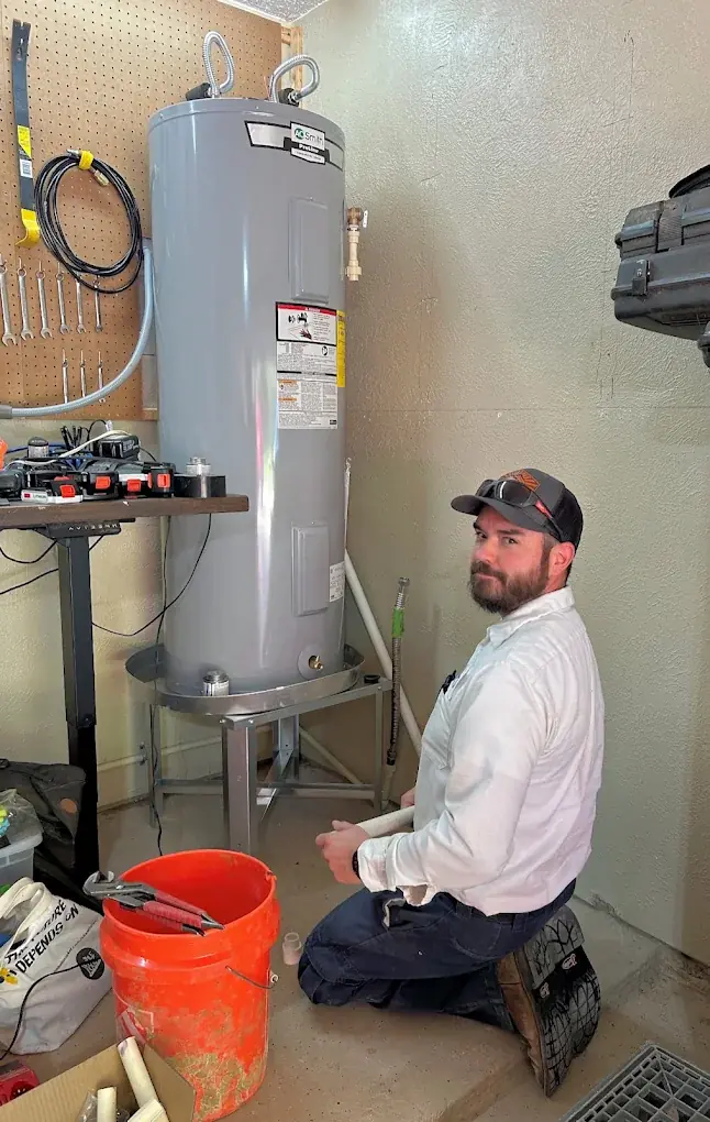 Rockwater Plumbing team with service van