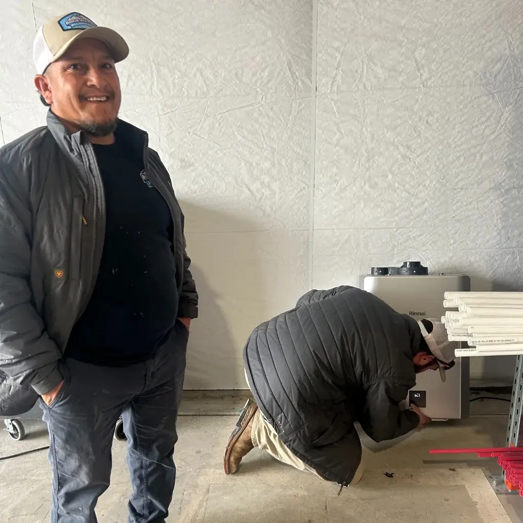 Rockwater Plumbing team with service van