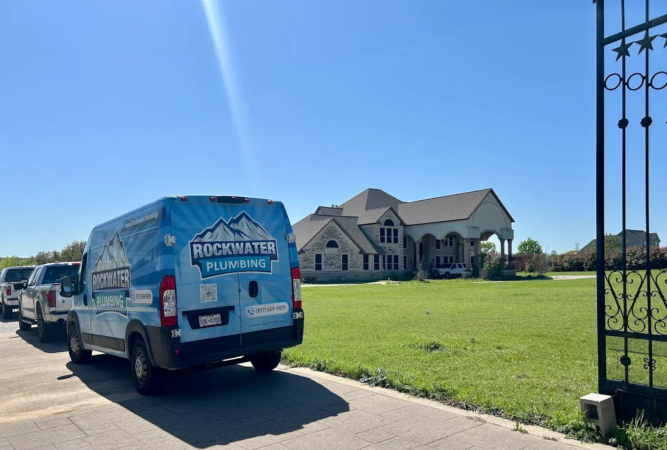 Rockwater Plumbing team with service van