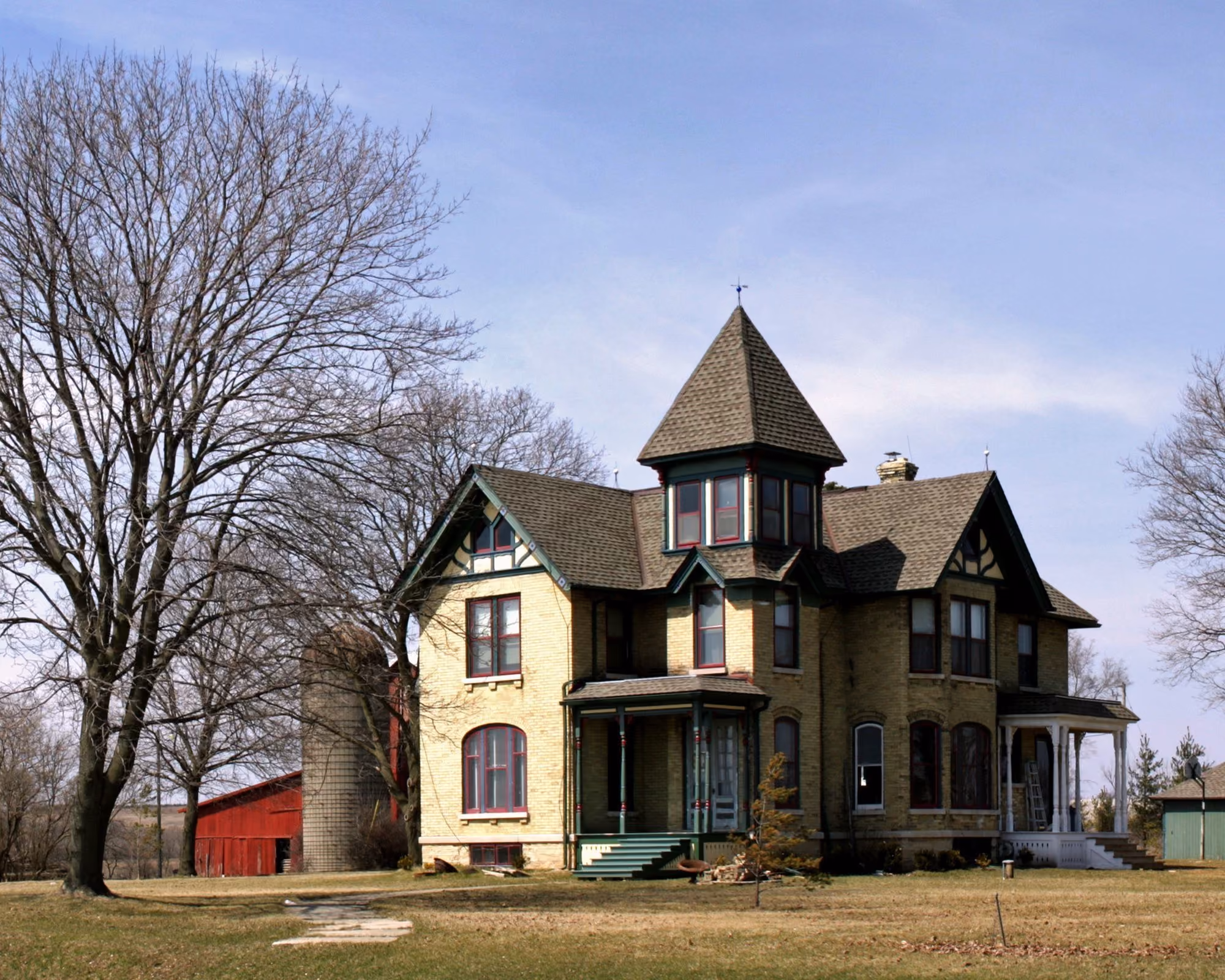 Heritage home among bare trees