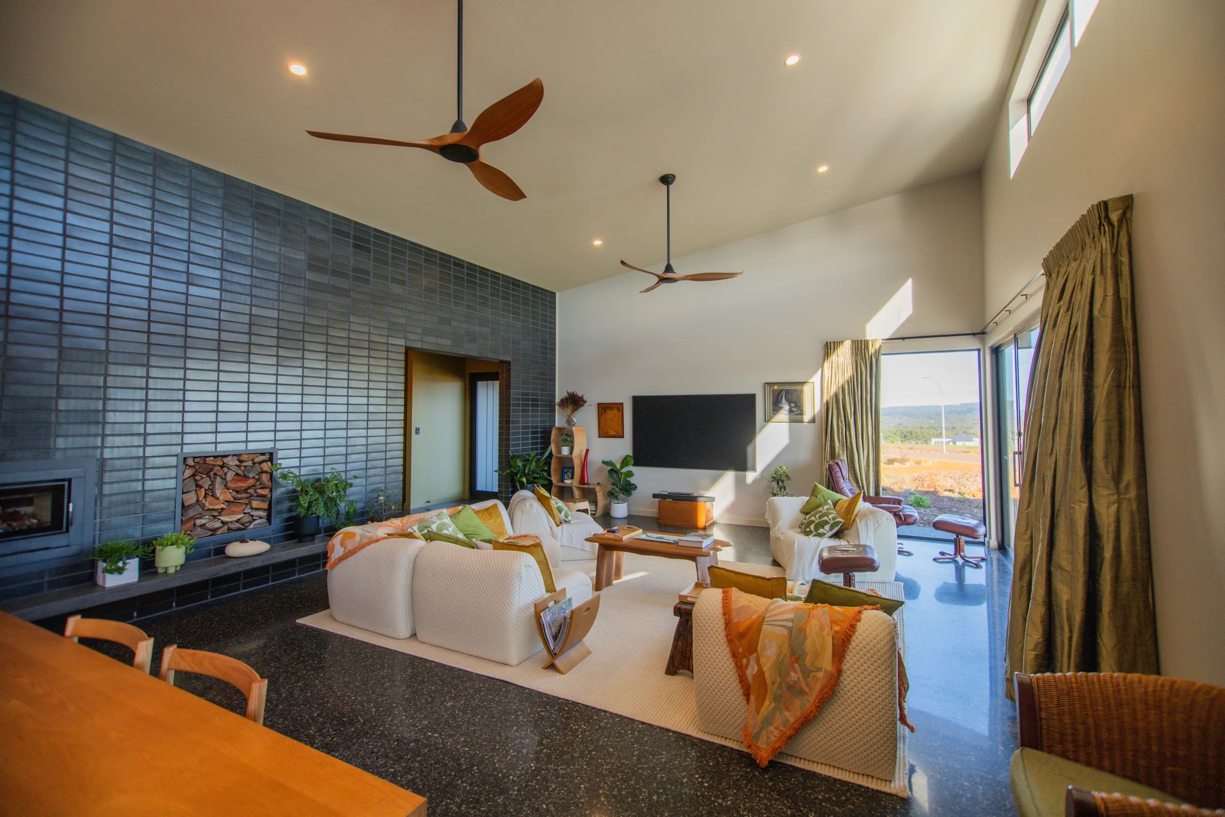 Living room with corner glazing looking out to open country