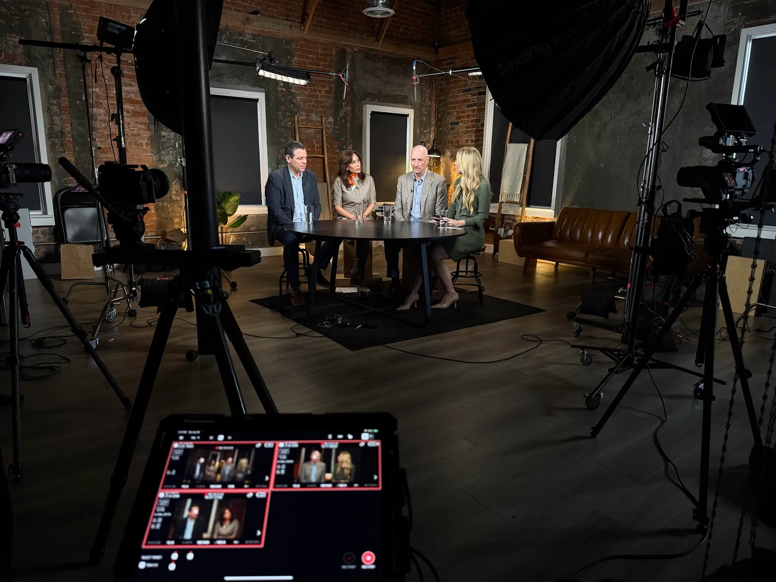 Multi-camera studio setup for a panel discussion