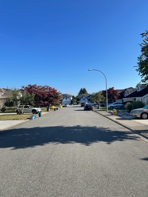 Quiet residential street in Ladner, BC on a sunny day