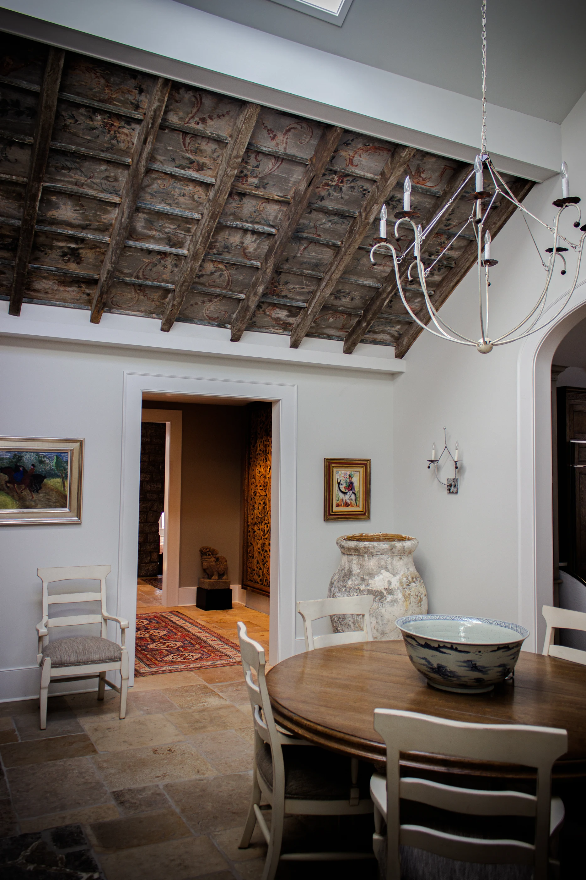 Breakfast room beneath a painted ceiling at Equestrian Estate.