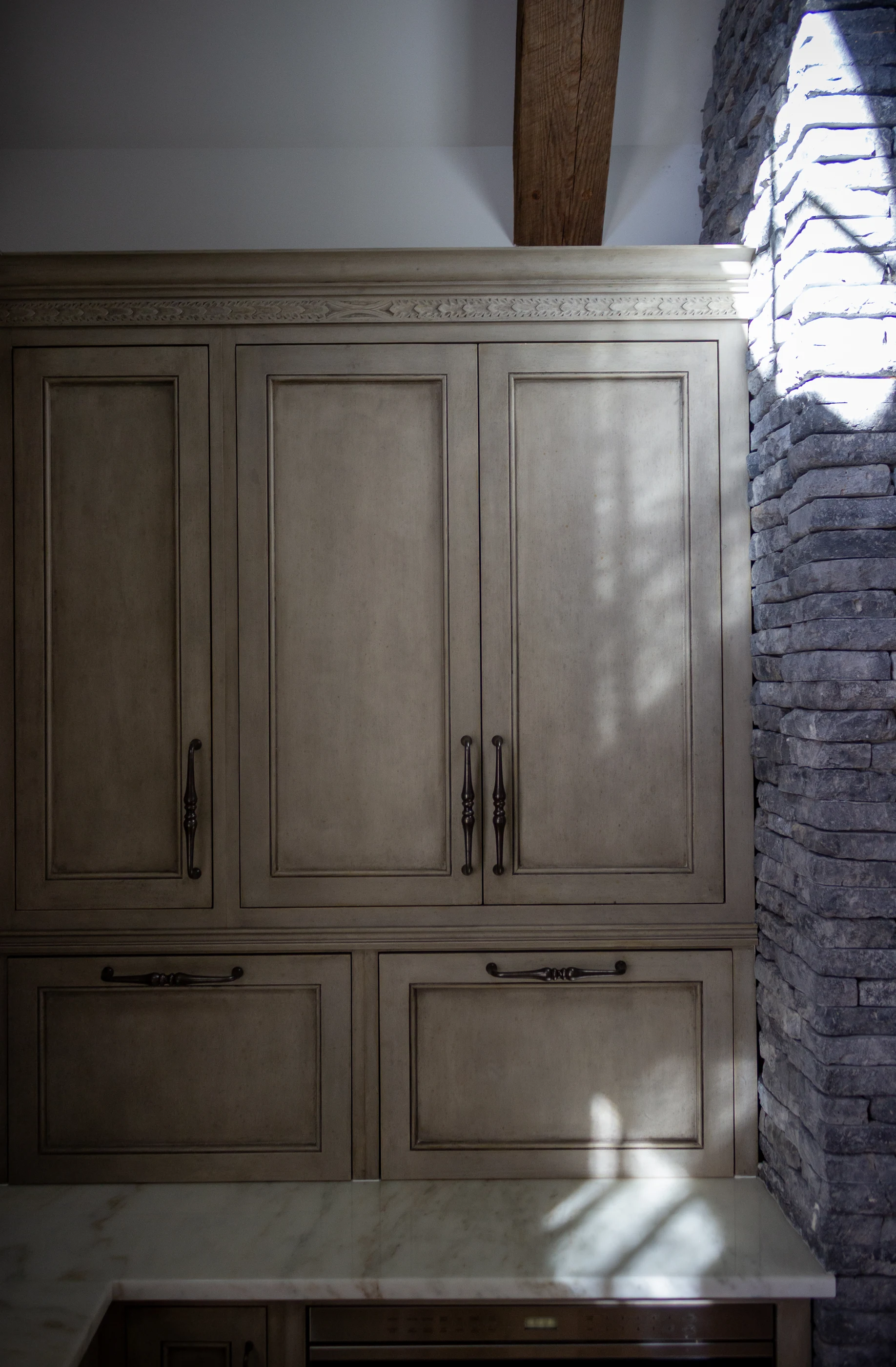 Pale cabinetry in soft natural light at Equestrian Estate.