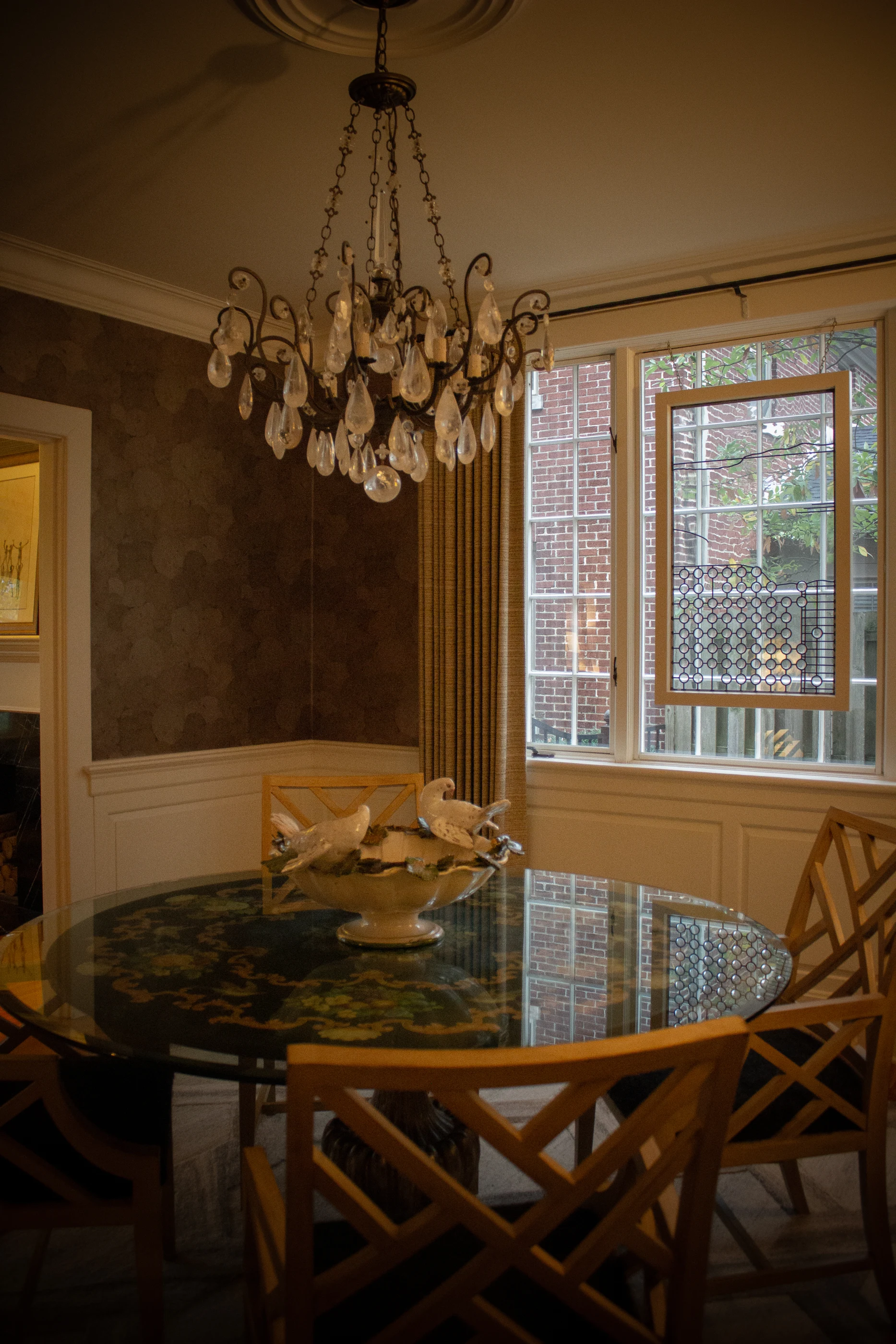 Crystal chandelier above the dining table at Ashland Park.